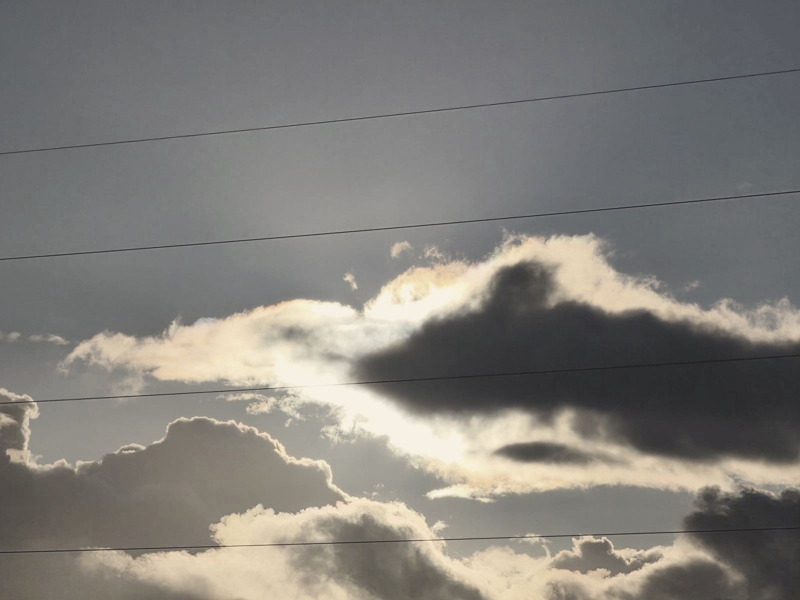 An iridescent cloud at dusk